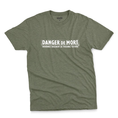 A green t-shirt with the French 'Danger De Mort' or Danger of Death in English.