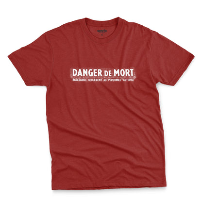 A red t-shirt with the French 'Danger De Mort' or Danger of Death in English.