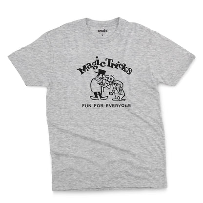 A gray marle t-shirt with a black graphic print on the front that reads 'Magic Tricks' above a cartoon of a magician and a spectator, with 'FUN FOR EVERYONE' printed below.