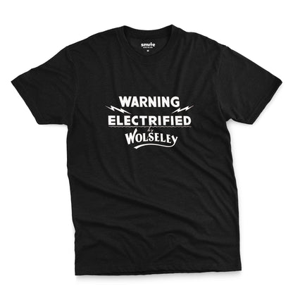 A black t-shirt with vintage graphics from an electric fence sign for the Wolseley brand from the early 1900s.