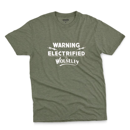 A green t-shirt with vintage graphics from an electric fence sign for the Wolseley brand from the early 1900s.