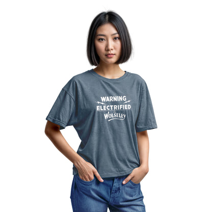 A blue t-shirt with vintage graphics from an electric fence sign for the Wolseley brand from the early 1900s.