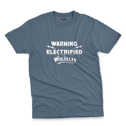 A blue t-shirt with vintage graphics from an electric fence sign for the Wolseley brand from the early 1900s.