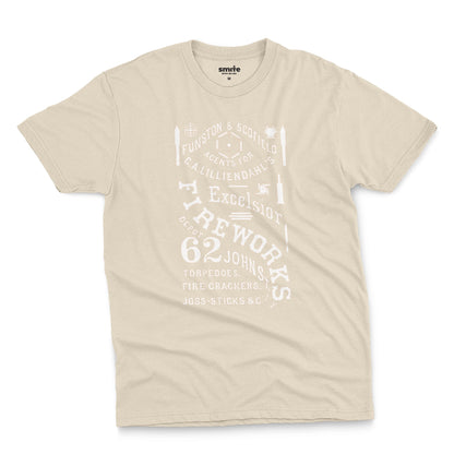 A beige t-shirt with a white vintage graphic of Excelsior Fireworks packaging.