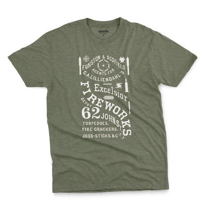 A green t-shirt with a white vintage graphic of Excelsior Fireworks packaging.
