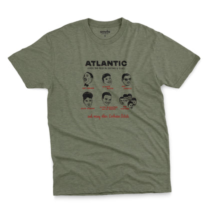 A green t-shirt featuring a vintage promotional graphic of famous rhythm and blues musicians on the Atlantic label from the 1950s.