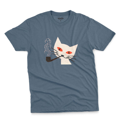 A blue t-shirt with a graphic of a white cat smoking a pipe, featuring orange eyes and black whiskers. The image is from a 1950s matchbox cover.