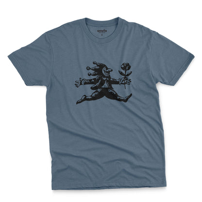 A blue t-shirt with an engraved illustration of a jester holding a rose from the early 1900s.