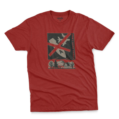 A red t-shirt with a retro graphic print of an anti-war message featuring a cross, a plane, a house, and the text 'DON'T BOMB THINGS'.