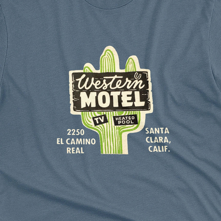 A blue t-shirt featuring a vintage advertisement for 'Western Motel' in Santa Clara, California.