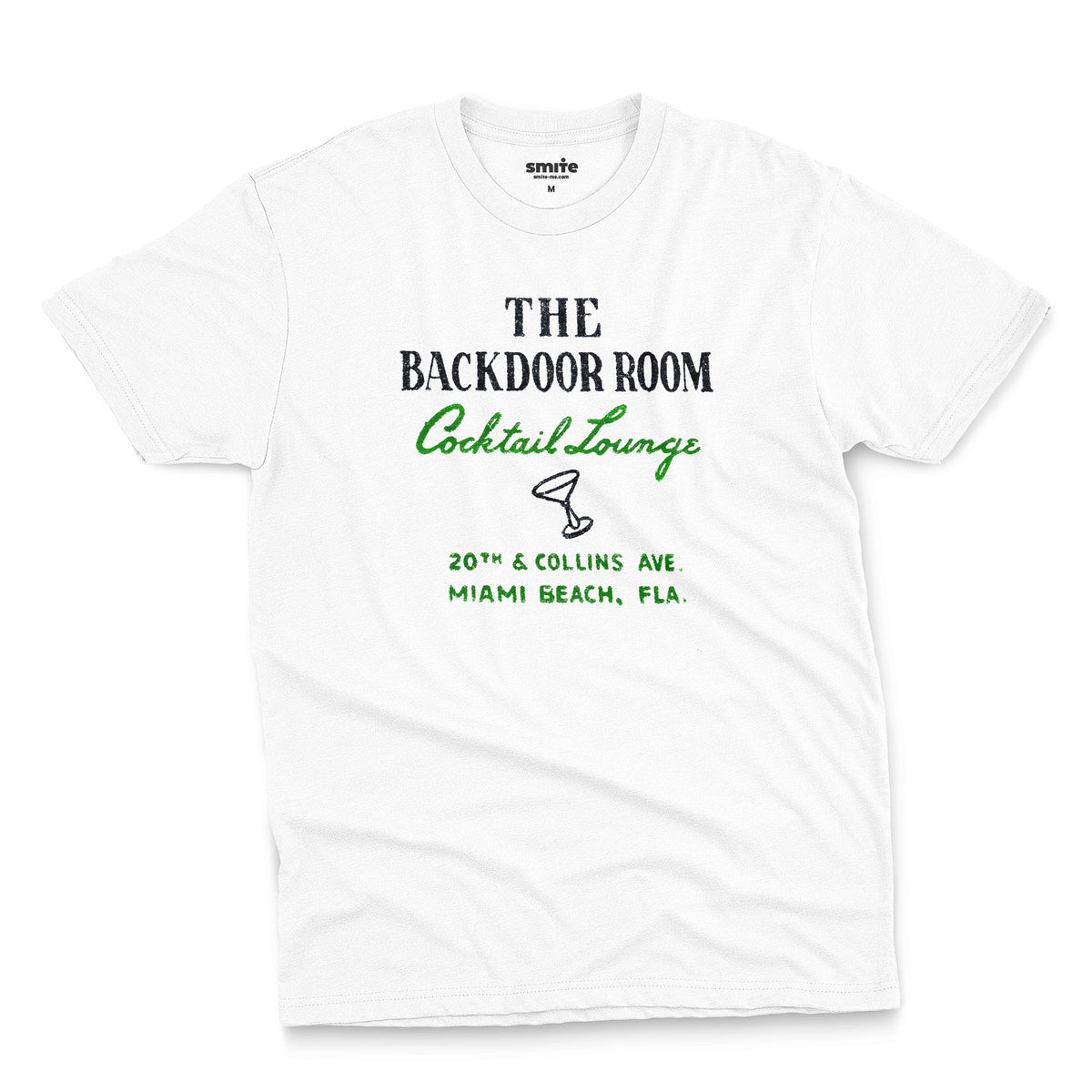 A white t-shirt with a retro advertisement for 'THE BACKDOOR ROOM Cocktail Lounge' on Miami Beach, Florida.