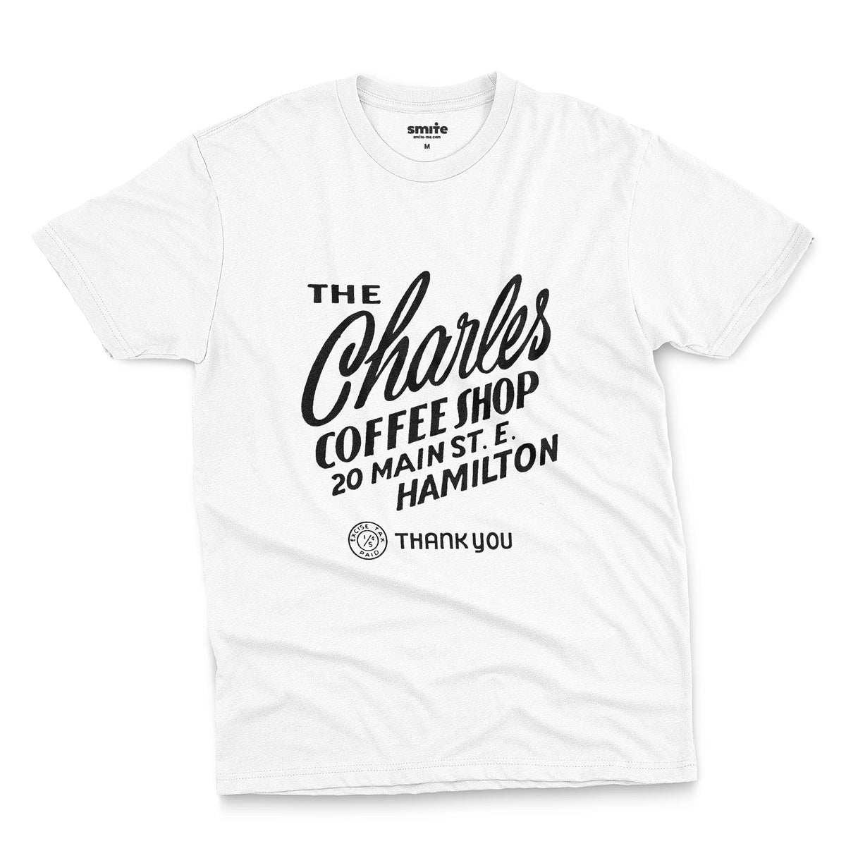 A white t-shirt with a retro typographic logo for The Charles Coffee Shop in Hamilton.