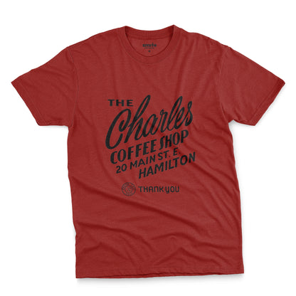 A red t-shirt with a retro typographic logo for The Charles Coffee Shop in Hamilton.