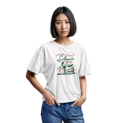 A white t-shirt featuring a retro advertisement for La Avenida Motel from the 1960s.