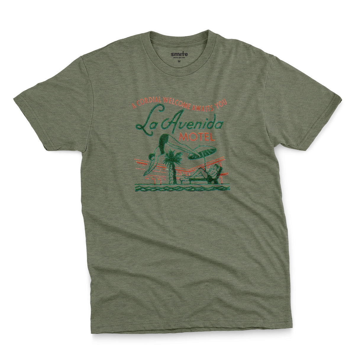 A green t-shirt featuring a retro advertisement for La Avenida Motel from the 1960s.