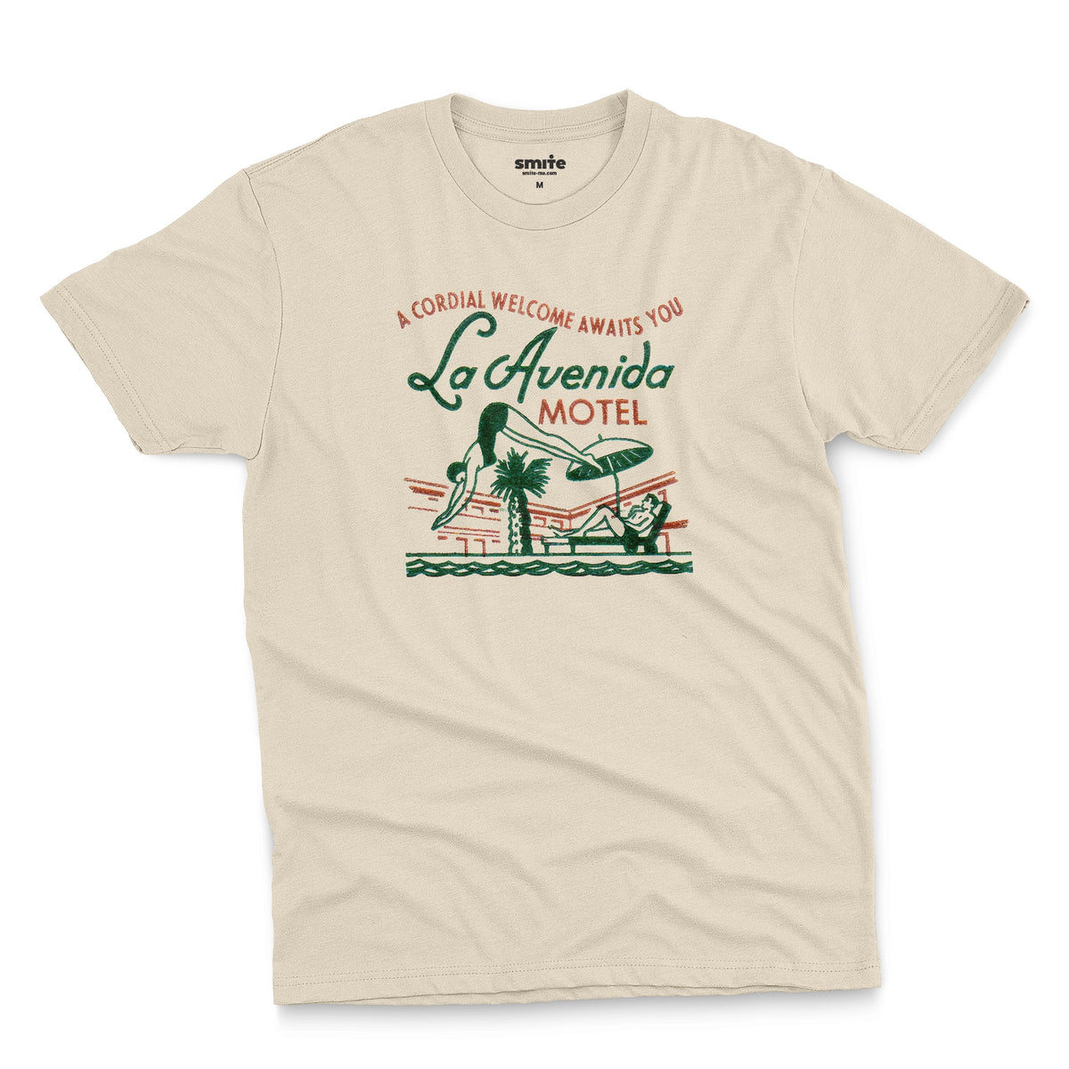 A beige t-shirt featuring a retro advertisement for La Avenida Motel from the 1960s.