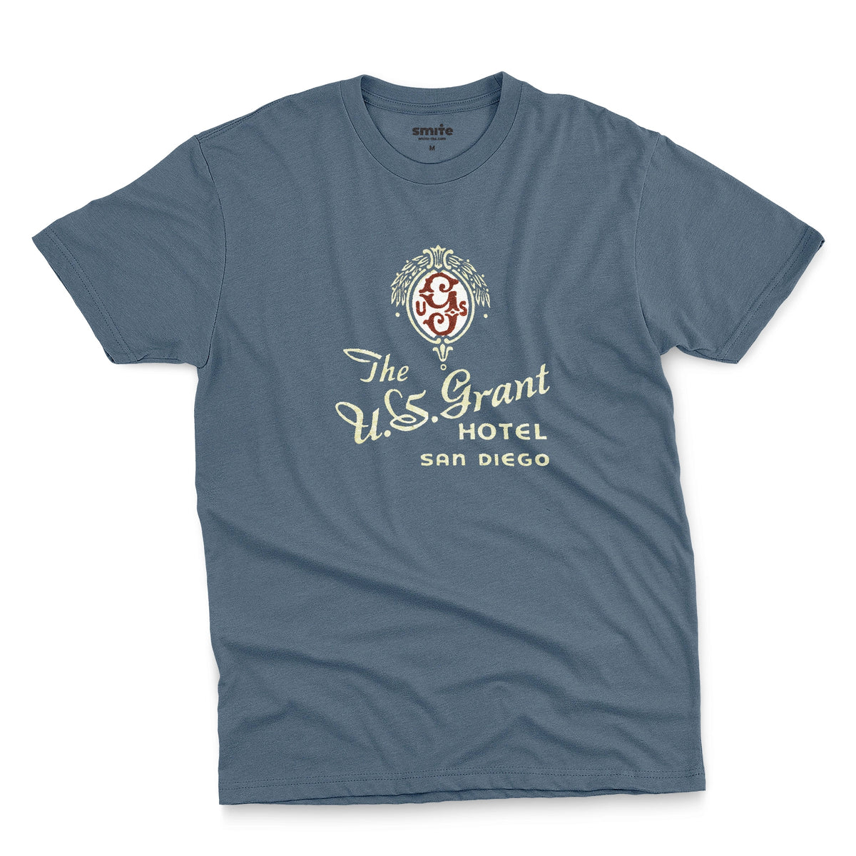 A blue t-shirt with a vintage logo for the U.S. Grant Hotel in San Diego.