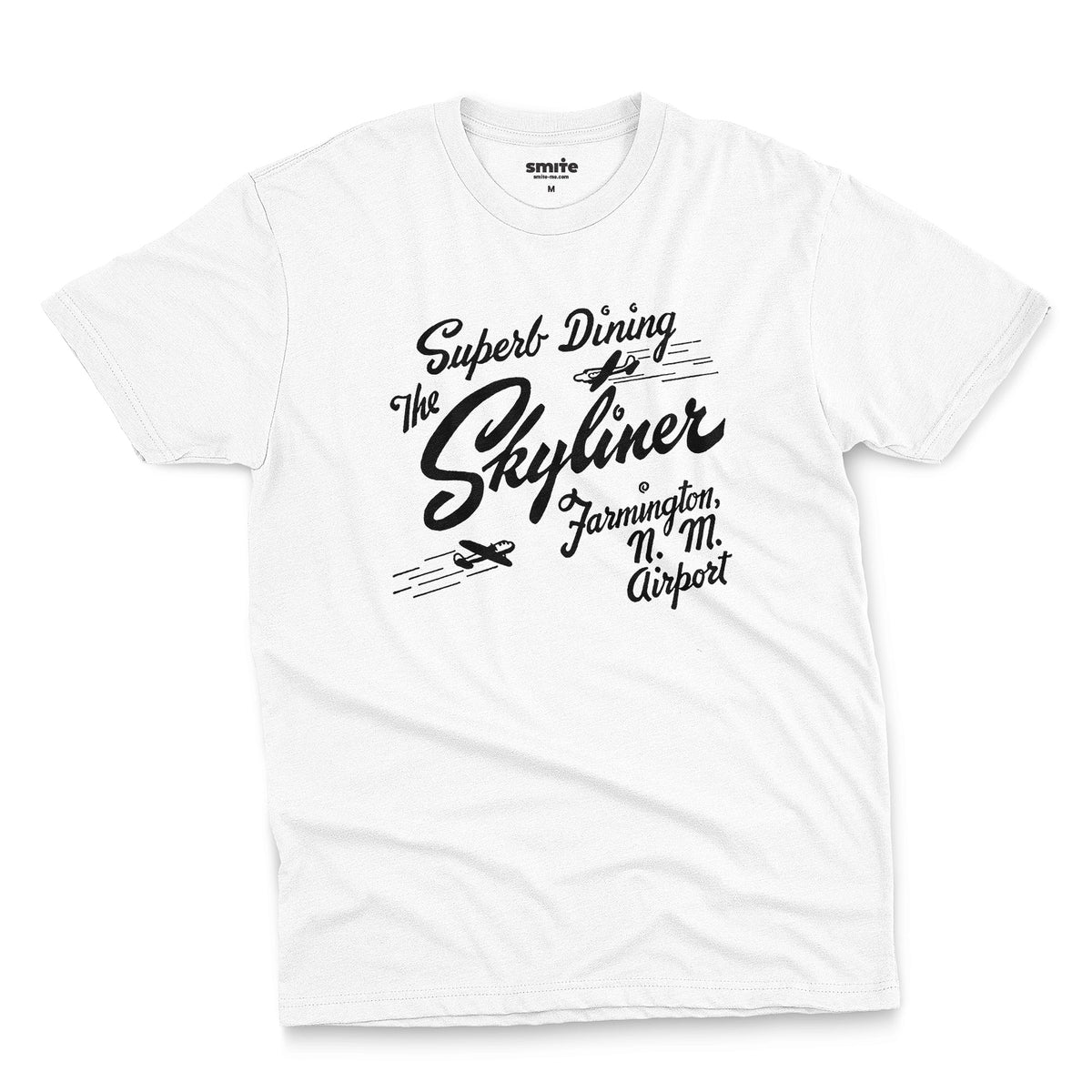 A white t-shirt with a retro advertisement for The Skyliner restaurant at the airport in Farmington, New Mexico.