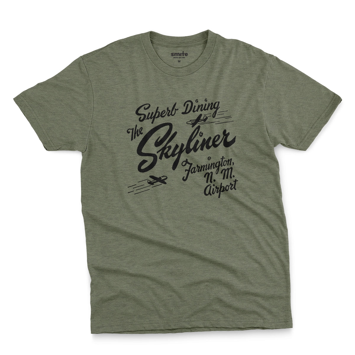 A green t-shirt with a retro advertisement for The Skyliner restaurant at the airport in Farmington, New Mexico.