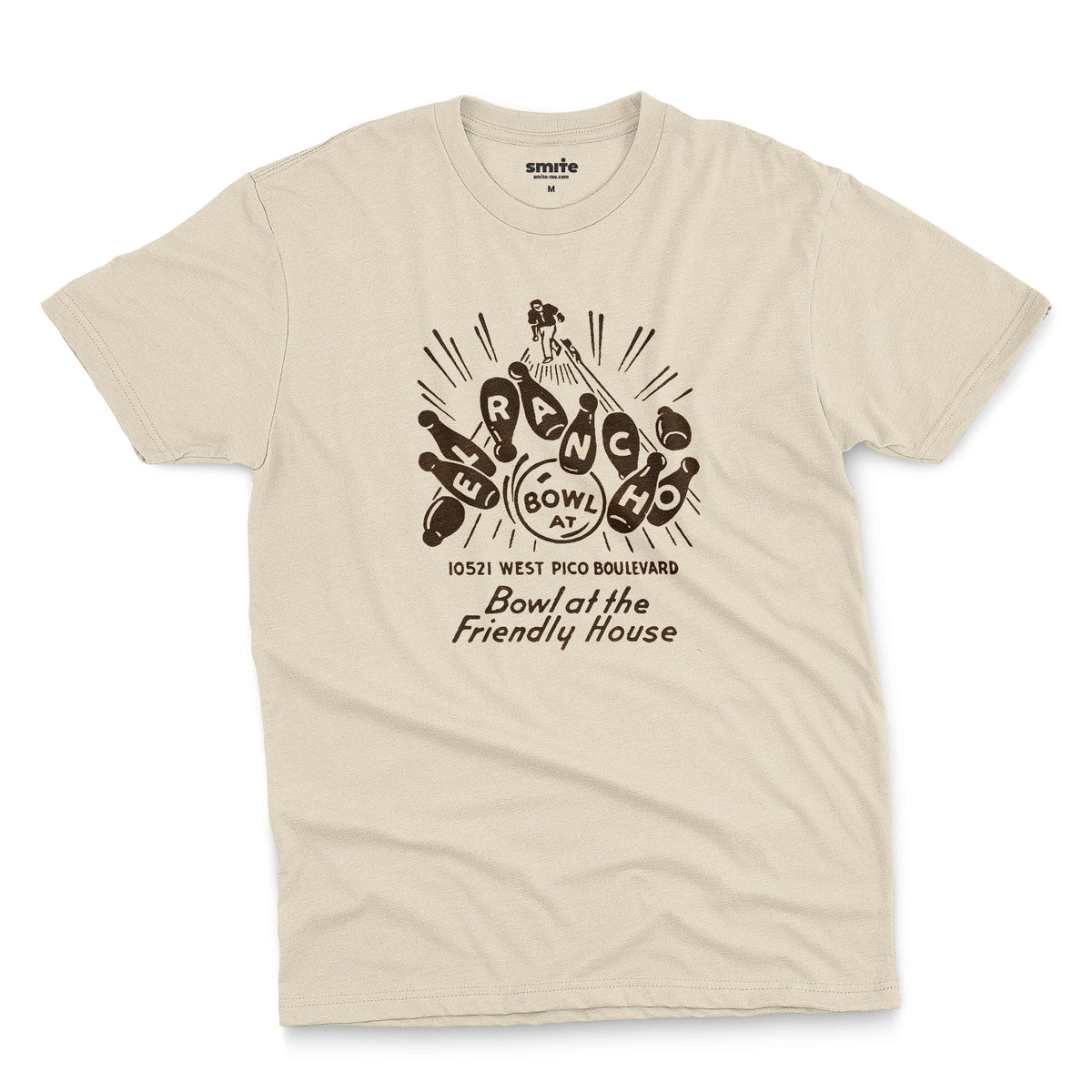 A beige t-shirt with a retro 1960s graphic advertisement for El Rancho bowling alley features bowling pins, bowling balls, and the text 'Bowl at the Friendly House' along with an illustration of a bowler.