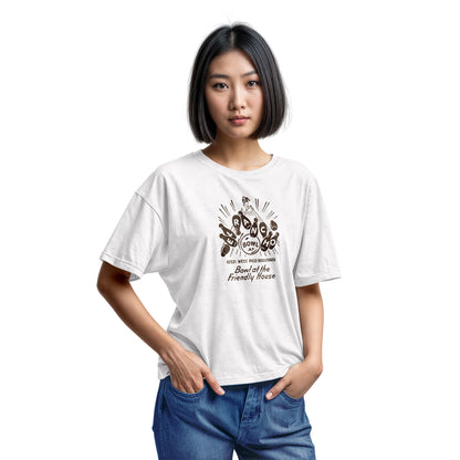 A white t-shirt with a retro 1960s graphic advertisement for El Rancho bowling alley features bowling pins, bowling balls, and the text 'Bowl at the Friendly House' along with an illustration of a bowler.