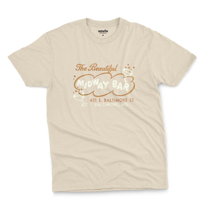 A beige t-shirt with a retro advertisement for the Midway Bar in Baltimore.