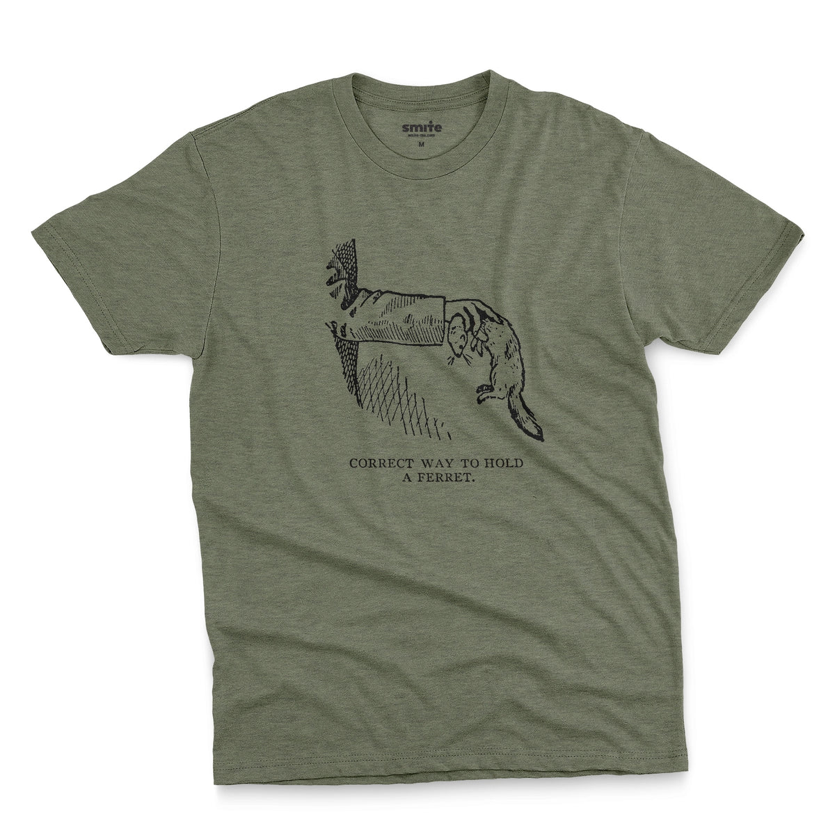 A green t-shirt with a vintage engraved illustration of an arm holding a ferret and text saying: Correct way to hold a ferret.