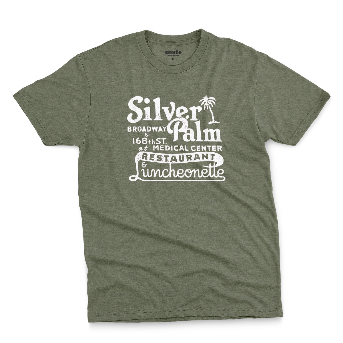 A green t-shirt with a retro advertisement for Silver Palm Restaurant in New York.