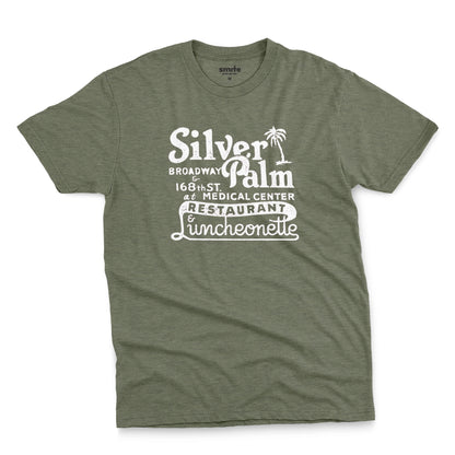 A green t-shirt with a retro advertisement for Silver Palm Restaurant in New York.
