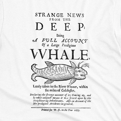 A white t-shirt with a graphic cover page print from 1677 about a whale caught in a river.