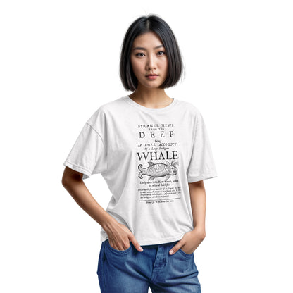 A white t-shirt with a graphic cover page print from 1677 about a whale caught in a river.