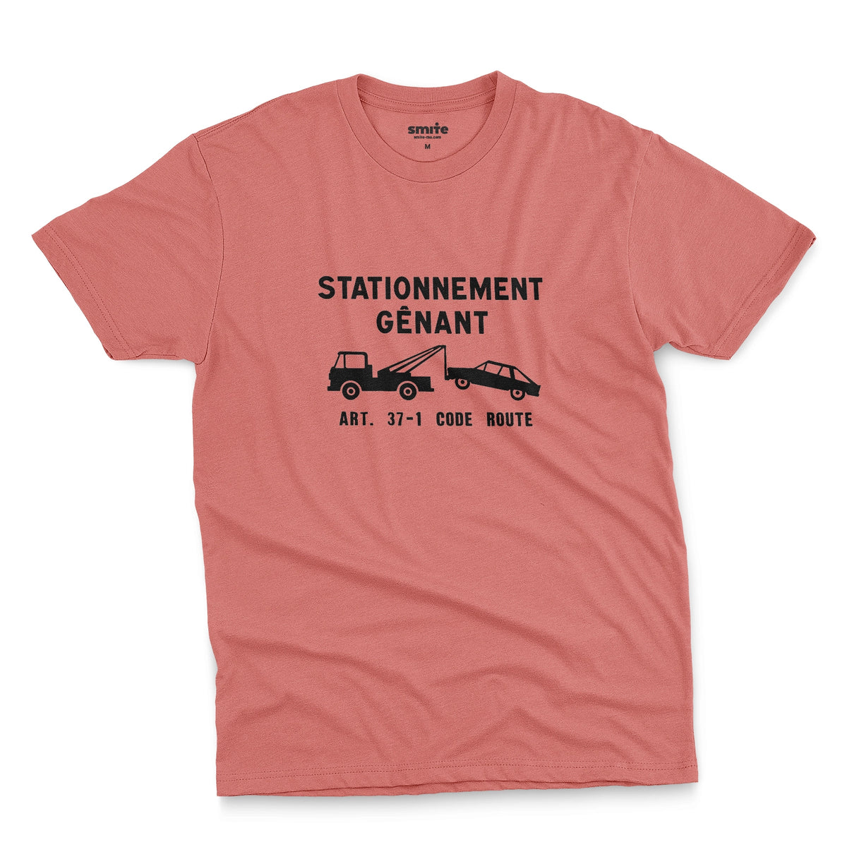 A coral pink t-shirt with a graphic print of a French street sign that says "nuisance parking" in French and a picture of a car being towed away.