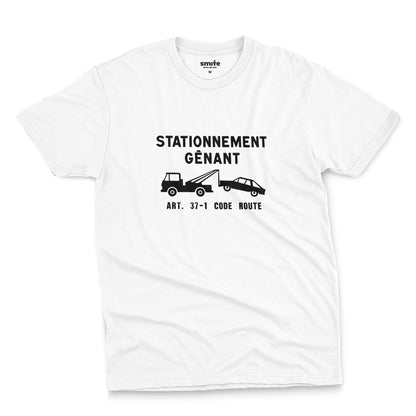 A white t-shirt with a graphic print of a French street sign that says "nuisance parking" in French and a picture of a car being towed away.