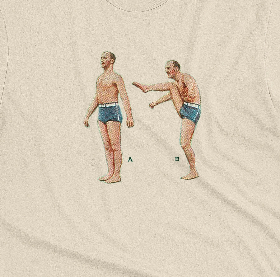 A beige t-shirt featuring a 1960s vintage graphic of an exercising man in blue swim trunks, labeled A and B.