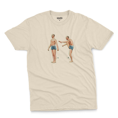 A beige t-shirt featuring a 1960s vintage graphic of an exercising man in blue swim trunks, labeled A and B.
