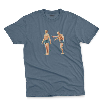  A blue t-shirt featuring a 1960s vintage graphic of an exercising man in blue swim trunks, labeled A and B.