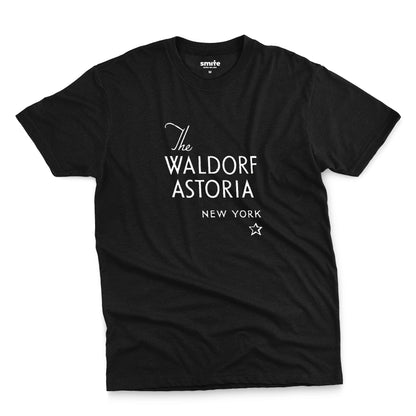 A black t-shirt with a retro logo for The Waldorf Astoria hotel in New York.