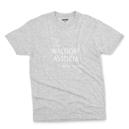 A gray marle t-shirt with a retro logo for The Waldorf Astoria hotel in New York.
