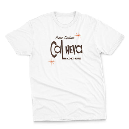 A white t-shirt featuring a retro graphic print of 'Frank Sinatra's Cal Neva Lodge', the legendary hotel and casino.