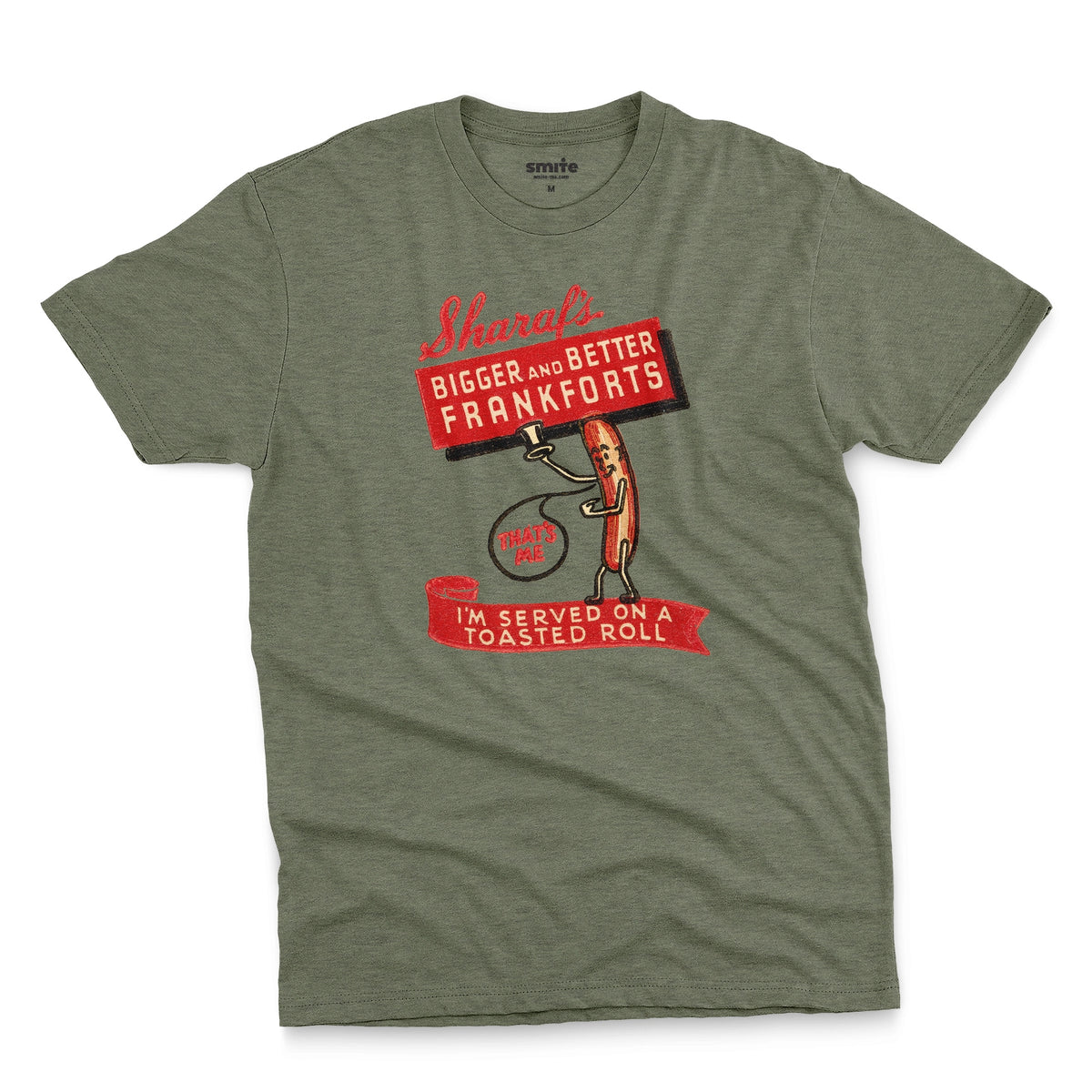 A green t-shirt with a vintage graphic print of a hot dog character holding a sign that reads 'Sharaf's Bigger and Better Frankforts'.
