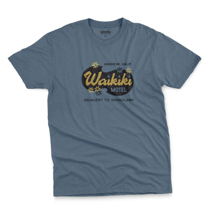 A blue t-shirt with a retro advertisement for the 'Waikiki Motel' in Anaheim, California.