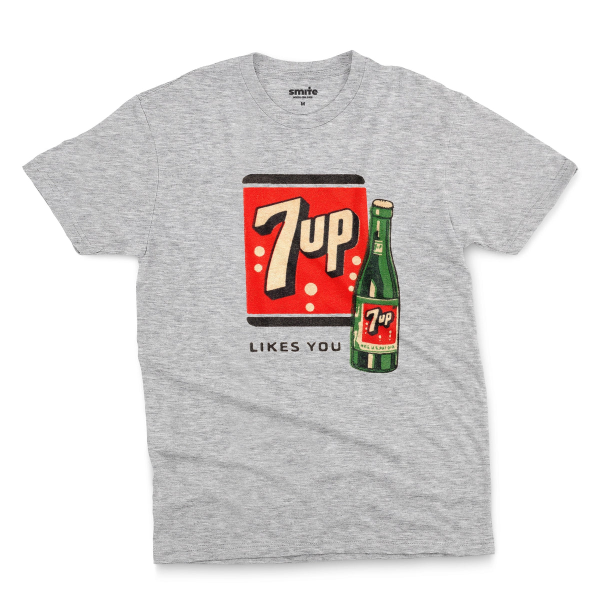 A gray marle t-shirt featuring a retro advertisement for 7up with the text '7up LIKES YOU'.