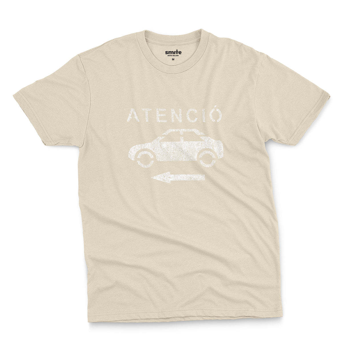 A beige t-shirt with a retro white stencil graphic of a car and the Spanish word 'ATENCIÓ'.