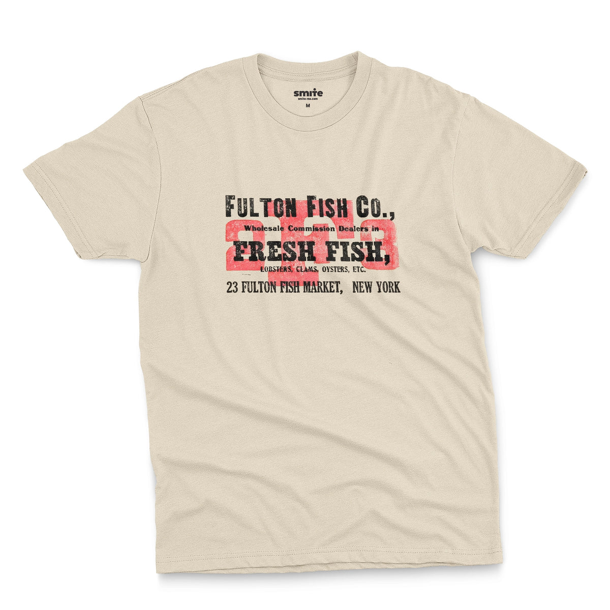 A beige t-shirt with an advertisement for the 'FULTON FISH CO' in New York from the 1970s.