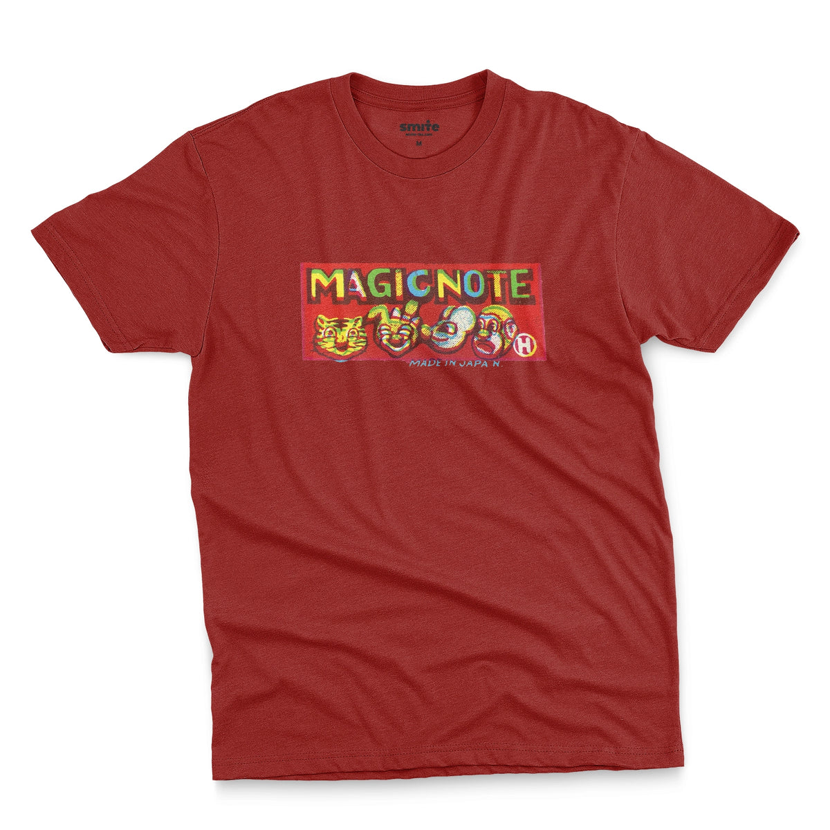 A red t-shirt with a colorful retro graphic logo for 'MAGICNOTE', a toy company in the 1960s.
