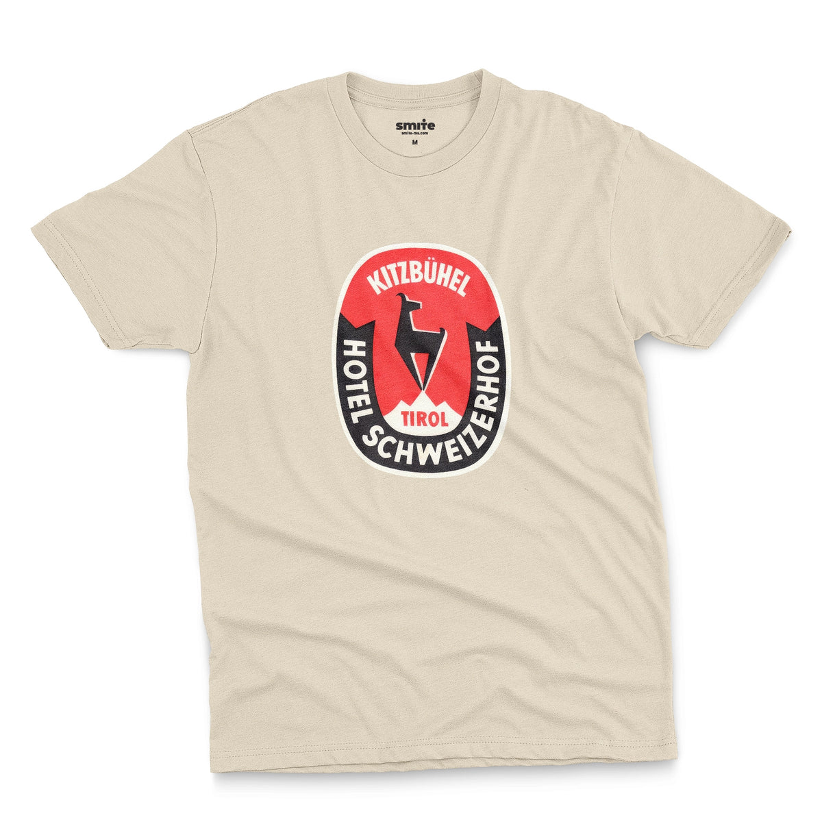 A beige t-shirt featuring a retro baggage label for the Hotel Schweizerhof in the Austrian Alps.